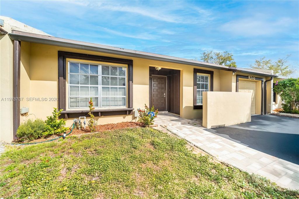 Photo of 9341 E Fern Ln, Miramar, FL 33025 (MLS # A11978707)