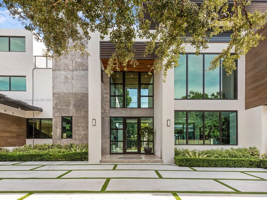 Welcome to this gorgeous fully furnished new construction home in the heart of South Miami’s High Pines neighborhood. Impeccable interiors by renowned designer Sensi Casa. This 7 | 7.5 home has it all: a spectacular entryway with a 10-ft door and 10+ft ceilings throughout the first floor; a grand, open kitchen with custom cabinetry and appliances from Mia Cucina; impeccably-designed bathrooms and custom closets; an elevator; rooftop deck with summer kitchen; smart-home technology throughout; solar panels with tesla batteries and a dedicated home gym with sauna and steam rooms. The home is centered around a resort-like pool that can be seen from almost every room in the house. Incredible spaces, design and a prime location make this an unparalleled offering.