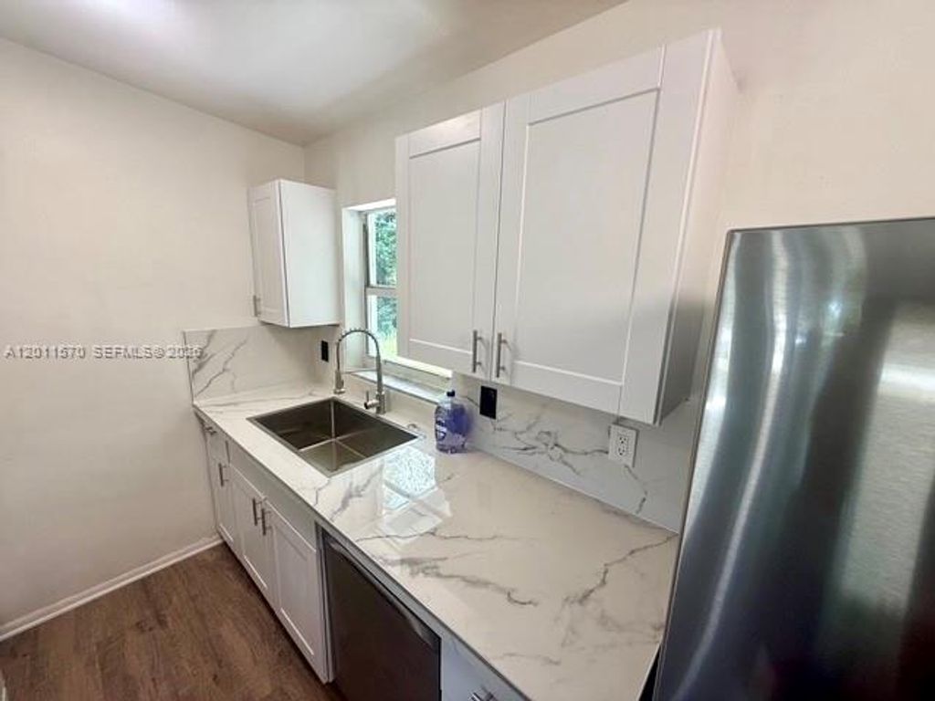 Photo of 530 Mentone Rd, Lake Worth, FL 33462 (MLS # A12011570)