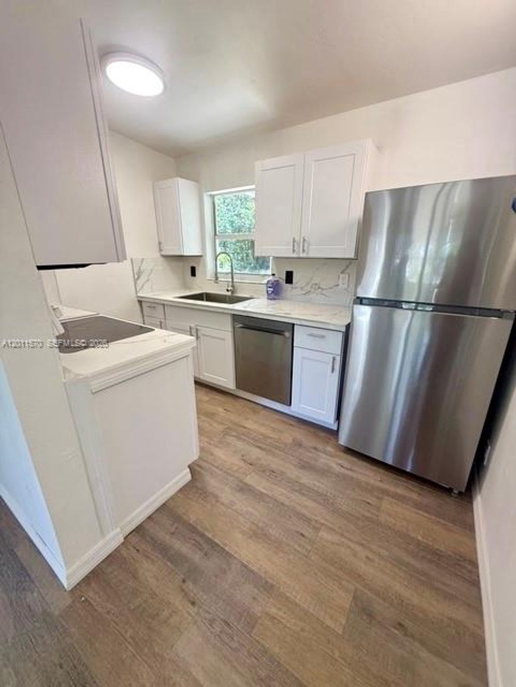 Photo of 530 Mentone Rd, Lake Worth, FL 33462 (MLS # A12011570)