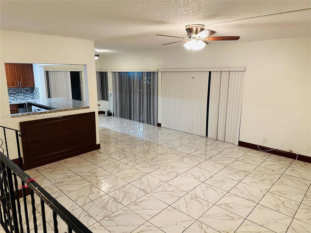 Photo of 4850 SW 63rd Ter #323, Davie, FL 33314 (MLS # A11780089)