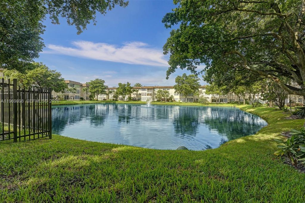 Photo of 3430 NW 52nd Ave #210, Lauderdale Lakes, FL 33319 (MLS # A11969898)