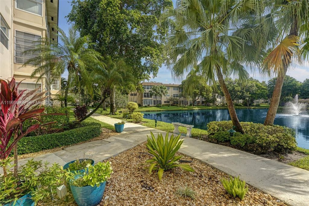 Photo of 3430 NW 52nd Ave #210, Lauderdale Lakes, FL 33319 (MLS # A11969898)