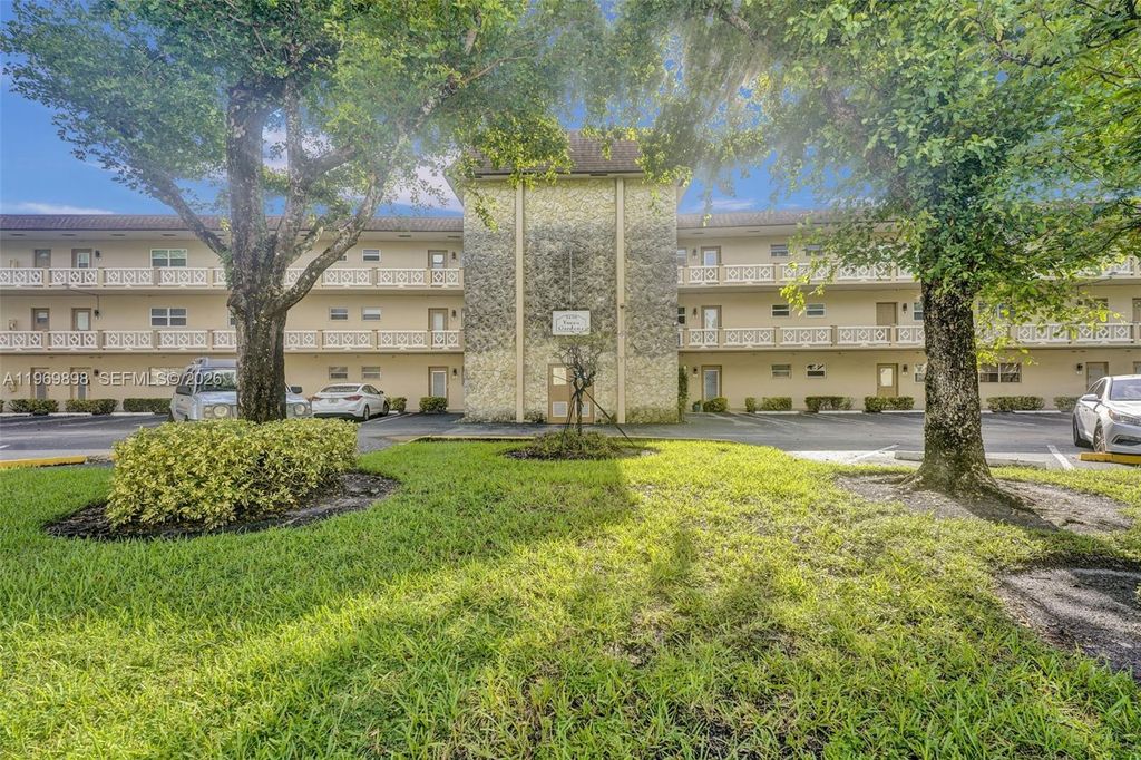 Photo of 3430 NW 52nd Ave #210, Lauderdale Lakes, FL 33319 (MLS # A11969898)