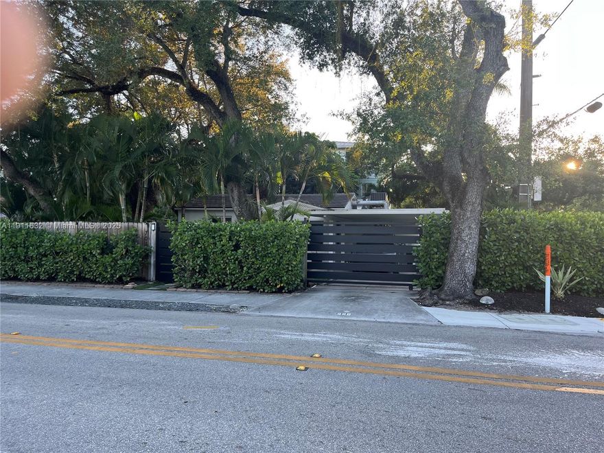 Beautiful totally renovated home immerse in nature located near downtown and las olas and 15 min ride to the beaches. Interesting design with character merging classic and contemporary together. 3/2 with and additional office. This 1500 sq. foot home has an open feel with a living area with open kitchen and connecting to a more contemporary room with beam ceiling and wide windows with sliding doors. Property is all private with automatic gate. Hedges all around accentuates the green feel with the 5 big oak trees.