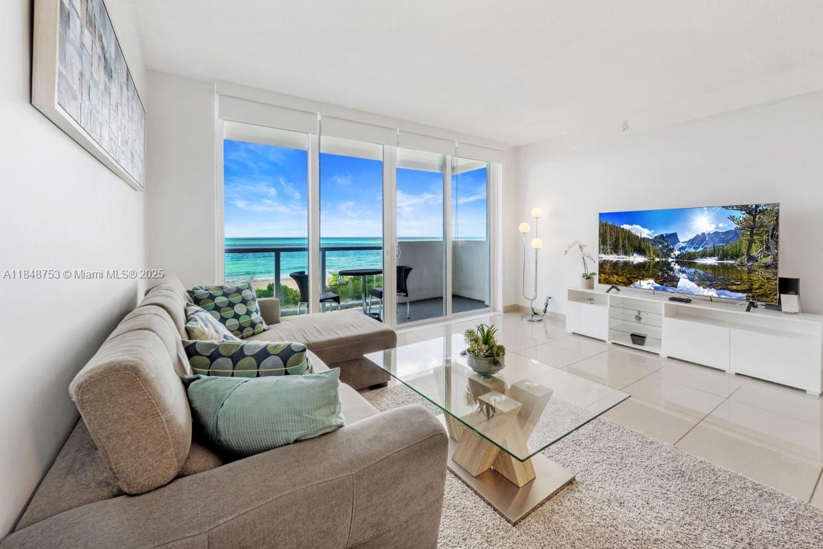 This stunning 1-bedroom, 1.5-bath condo on the 5th floor offers an unbeatable living experience with panoramic ocean views that stretch across the kitchen, living room,
and out onto the private balcony. Located in a sought-after oceanfront building, this unit combines modern comfort with the beauty of coastal living. Enjoy a suite of luxurious
amenities, including direct beach access, a sparkling pool, a fully equipped gym, 24-hour parking, on-site security, and valet service. With short-term rentals permitted, this property
presents an excellent investment opportunity. Plus, an assigned parking space adds extra convenience—something few units in the building offer. Minimum rent 6 days.
INCLUDES DESIGNATED PARKING. WASHER AND DRYER IN HALLWAY.