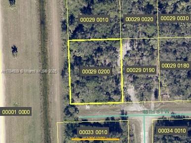 Corner vacant lot 0.35 acres zoned residential.