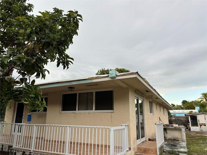 Come check out this beautiful family home, wonderfully located near the entrance of Key Largo. This home features 3 bedrooms and 2 bathrooms, along with a spacious den that can be utilized as a spare bedroom, den, family room, playroom, or office. This property features a fruit tree, ample outdoor space, and parking. The roof is brand new as of October 2025, and impact windows and doors as of 2023.