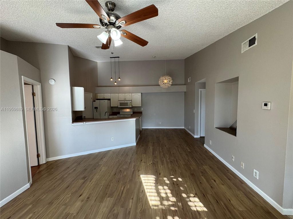 Photo of 9999 Summerbreeze Dr #108, Sunrise, FL 33322 (MLS # A11959889)