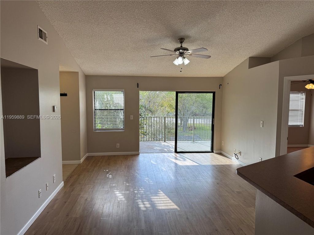 Photo of 9999 Summerbreeze Dr #108, Sunrise, FL 33322 (MLS # A11959889)