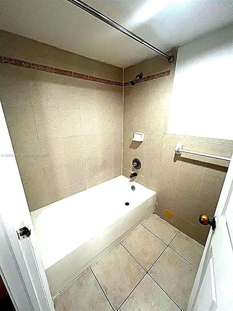 Tiny photo for 1122 Coral Club Dr #1122, Coral Springs, FL 33071 (MLS # A12005517)