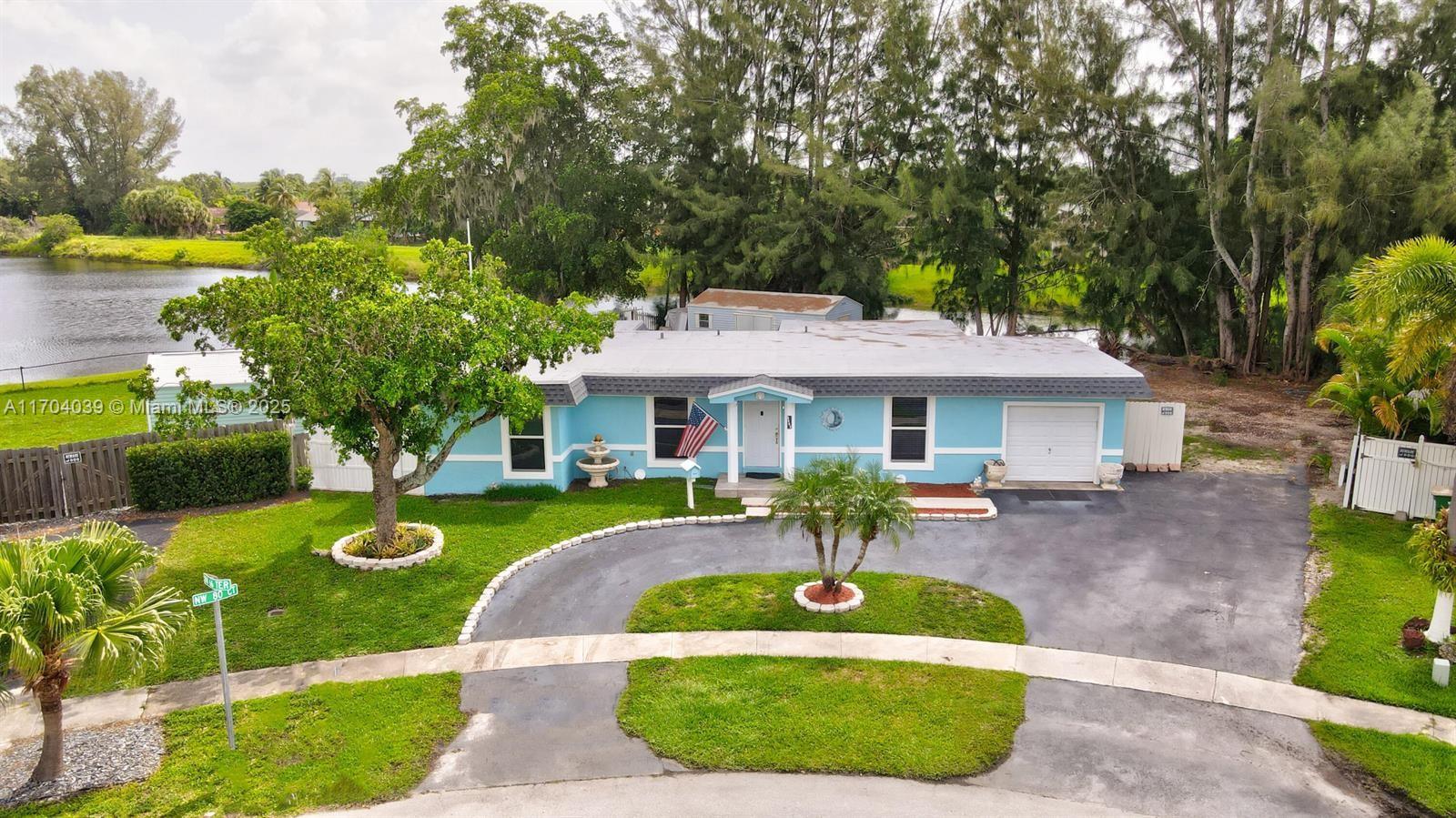 Property for Sale at 6605 Nw 80th Ct, Tamarac, Broward County, Florida - Bedrooms: 4 
Bathrooms: 2  - $525,000