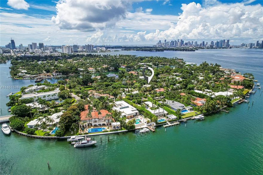 Rare opportunity on Sunset Island 1! Spectacular 18,225sf lot with fully renovated home and separate guesthouse. Main house consists of 5 bedrooms/6 baths. Fabulous floor plan for a family w/4 ensuite beds upstairs. Open gourmet eat-in kitchen & diverse living + dining areas, huge pool area with expansive outdoor entertaining space, a tropical roofed patio and lush landscaping on this oversized lot. Gated community with roving security makes this a perfect residence for the discerning family. Pleasure to show with 24/hrs. notice.