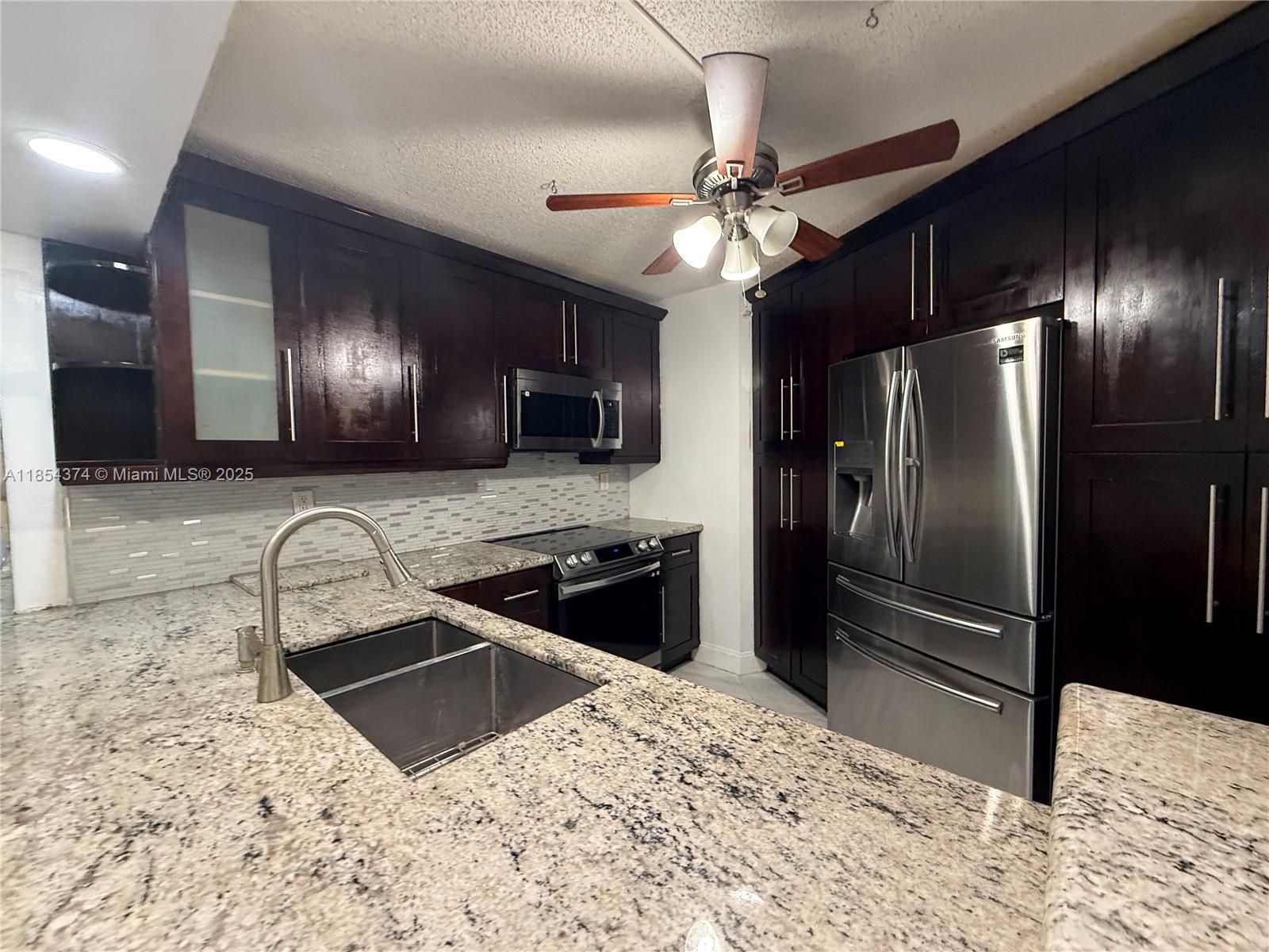 Spacious 2-Bedroom, 2.5-Bath +Den Townhouse for Rent with its own big fenced yard in Boca Rio. Recently cosmetically remodeled. Renting ASAP Unfurnished with Washer & Dryer, assigned parking spot, storage unit and plenty of guest parking available. Tiled floors, Granite Counter Tops, open kitchen with Stainless Steel Appliances, Guest Bath Marble and Granite, Master Bathroom with jacuzzi size bathtub, and walk-in closets. Located in the desirable Boca Rio Townhouse Community. Enjoy access to community amenities including a swimming pool, tennis courts, and clubhouse.