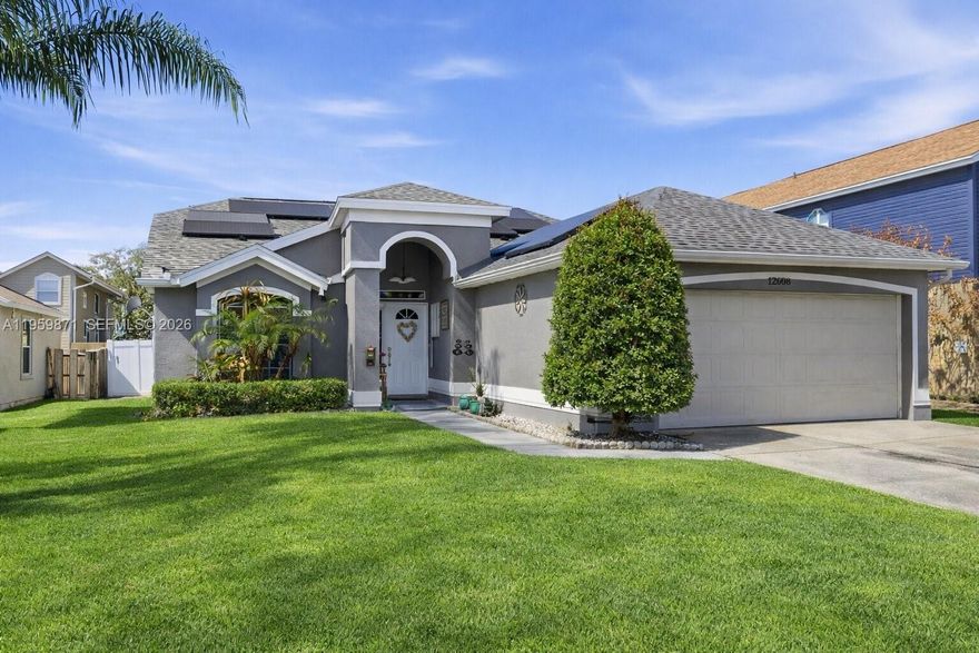 Location, Location!! Welcome to this well-maintained home in the desirable Deerfield community of Orlando! This property features a 2-car garage, updated flooring throughout, and a renovated kitchen and bathroom, offering both comfort and modern appeal. The roof was replaced in 2023, providing peace of mind for years to come.The home is equipped with solar panels (buyer to assume lease or to be paid at closing), helping reduce monthly energy costs. Enjoy an unbeatable location next to a neighborhood park with tennis courts and just steps from John Young Elementary School. Conveniently located near John Young Parkway, major highways, shopping, dining, Orlando International Airport, and world-famous attractions. This is a fantastic opportunity to own a home in a well-established community with low HOA and excellent accessibility. Schedule your showing today!