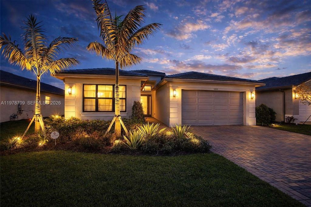 Photo of 10922 SW Meandering Mile Rd #10922, Port St Lucie, FL 34987 (MLS # A11978709)