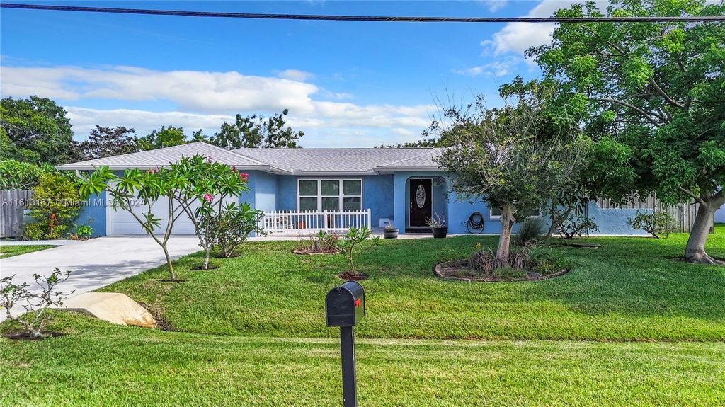 Photo of 2392 SE Grand Dr, Port Saint Lucie, FL 34952 (MLS # A11613167)