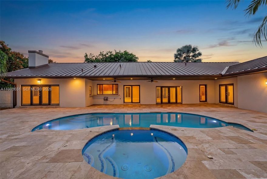 Located in one of Palmetto Bay’s most sought-after neighborhoods, this meticulously maintained pool home offers the perfect blend of comfort, functionality, and modern upgrades.
Featuring impact windows and doors, 2024 aluminum roof, and full-house generator with propane tank, this home delivers peace of mind and true move-in readiness. Interior highlights include vaulted ceilings, plantation shutters, indoor laundry, two AC systems, and surround sound throughout.
Designed for today’s lifestyle, the home also includes an electric vehicle charger and seamless indoor-outdoor flow ideal for entertaining.
Step outside to your private oasis with a beautifully appointed pool, travertine deck, and expansive covered patio with extended wraparound roofline—perfect for year-round outdoor living. Mature landscaping provides privacy and a serene setting.
Situated near top-rated A+ schools, parks, and everything Palmetto Bay has to offer, this property stands out as one of the best values in the area.
Move-in ready, upgraded, and built for both everyday living and entertaining—this is a home you don’t want to miss.