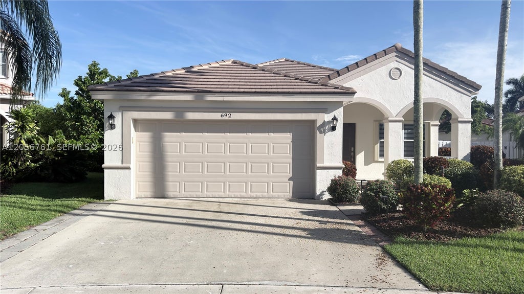 Photo of 692 Maplewood Ct, Weston, FL 33327 (MLS # A12056761)