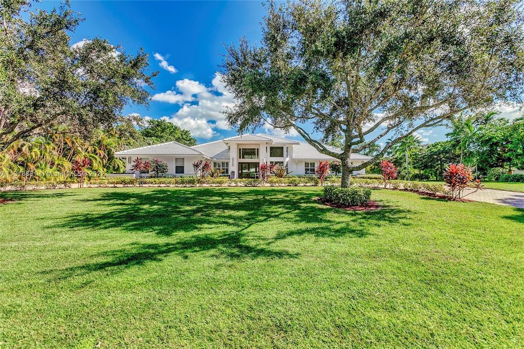 Photo of 5125 Misty Morn Rd, Palm Beach Gardens, FL 33418 (MLS # A11318881)
