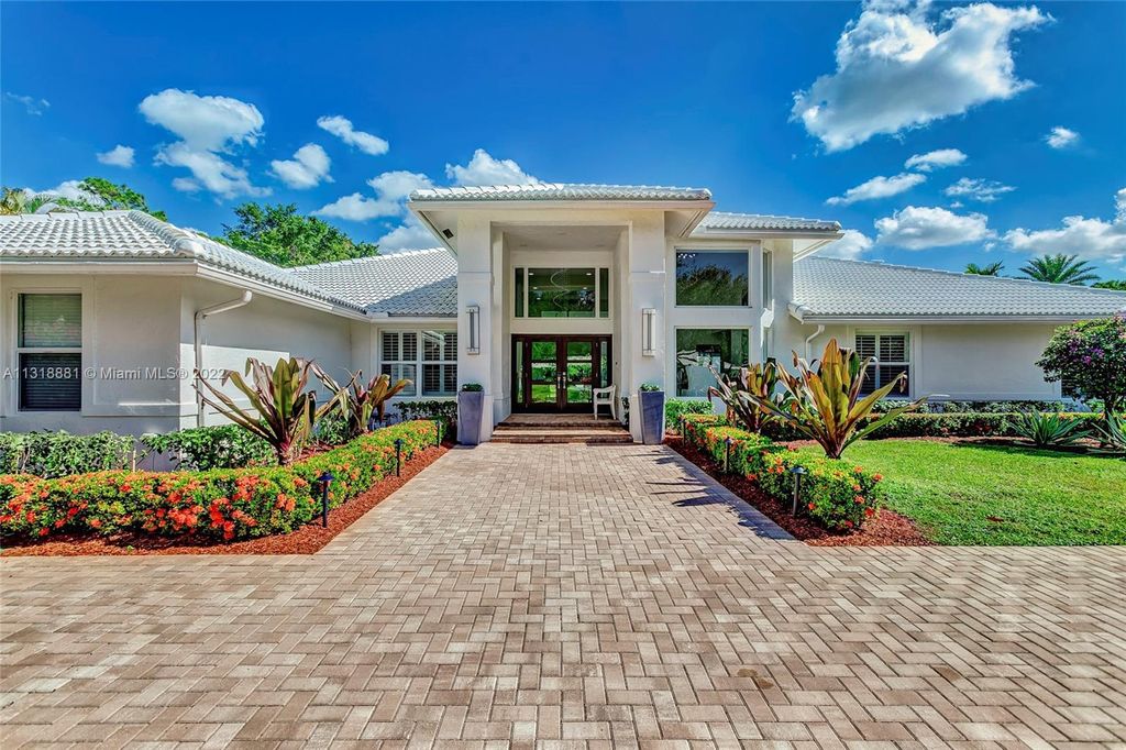 Photo of 5125 Misty Morn Rd, Palm Beach Gardens, FL 33418 (MLS # A11318881)