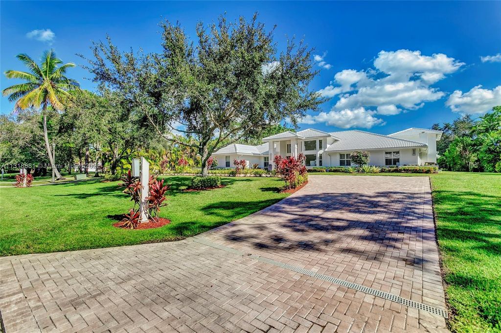 Photo of 5125 Misty Morn Rd, Palm Beach Gardens, FL 33418 (MLS # A11318881)