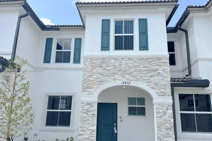 This stunning 1,533 sqft, 3-bedroom, 2.5-bath townhouse in the highly sought-after Westview by Lennar community is in pristine condition and move-in ready. The "Monte Carlo" model features tile flooring downstairs, carpet upstairs, a modern kitchen with stainless steel appliances and quartz countertops, plus blinds and bathroom kits. Enjoy the convenience of a washer and dryer, a fenced backyard, and 2 parking spaces. The community offers a clubhouse with a pool and playground, and it's just minutes from top-rated schools, shops, restaurants, and I-95. Ideal for both personal living and rental income!----------UNIT RENTED TILL 4/30/2026, PAYS $3,050.00 PER MONTH - TENANT CAN SHOW THE UNIT WITH 24HS NOTICE
