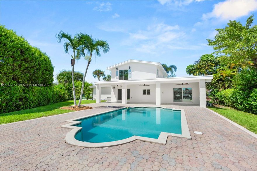BOATERS DREAM! Waterfront rental in King Bay! Fully renovated 4BR/3BA modern home beautiful hardwood floors and a 2 car garage. Features open living spaces, updated kitchen, impact windows/doors, and sleek finishes throughout. Enjoy a private dock for boating with no bridges to bay, resort-style pool, and spacious fenced yard perfect for entertaining. Located in a secure gated community, family-friendly neighborhood with top-rated schools nearby. Rare opportunity to lease a luxury waterfront home in one of South Florida’s most desirable areas!