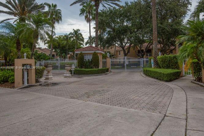 Great looking condo at Regatta Pointe..located on the west side of Miami Lakes. Updated kitchen and bathrooms. The property is a 3/2 with a 1 car garage. You enter through a nice courtyard to the 1st floor entry and all main living areas are upstairs. Light and bright throughout. Spacious bedrooms and closet organizers too Private gated entry to Regatta Pointe. There is community pool. Parking is for a 1 car garage, plus a second car outside. Enjoy Miami Lakes living, parks, shopping, dining and more. Call today for any questions or showings requests.