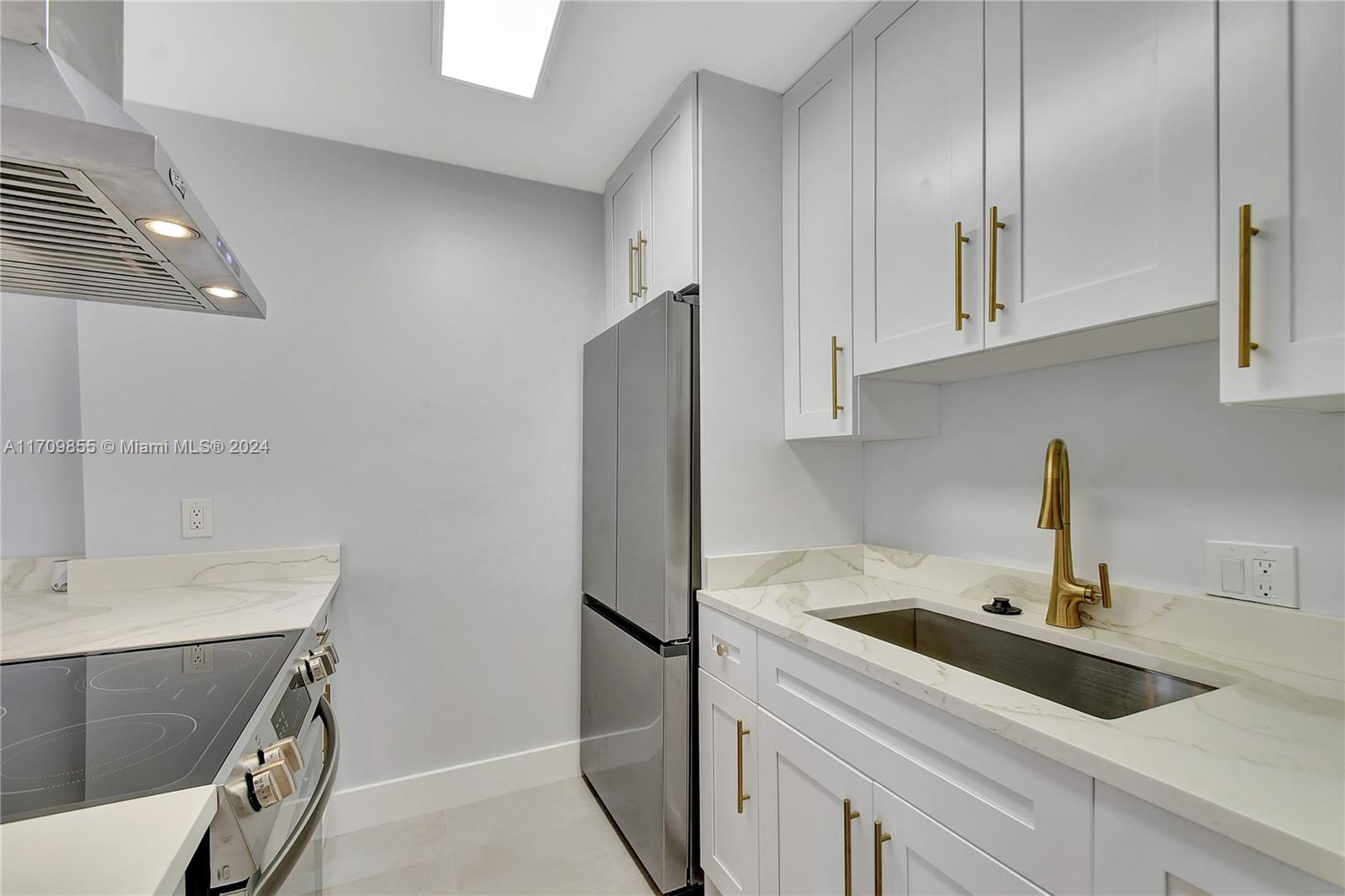 This beautifully remodeled 2-bed, 2-bath condo is ready for its new owner! Featuring an open floor plan and modern updates, it’s perfect for easy living. The kitchen boasts new appliances, quartz countertops, and fresh cabinets. New paint, ceramic tile floors, and updated baseboards flow throughout the unit.Both bathrooms have been fully renovated. Enjoy the convenience of a tankless water heater and full-size washer/dryer inside the unit. Step outside to a private fenced courtyard or relax on the upstairs balcony patio. Additional features include a new roof (2023) and fresh exterior paint. The Crossings offers a pool, playground, tennis courts, and security patrol. Minutes from the beach, shopping, and dining—Move-in ready!