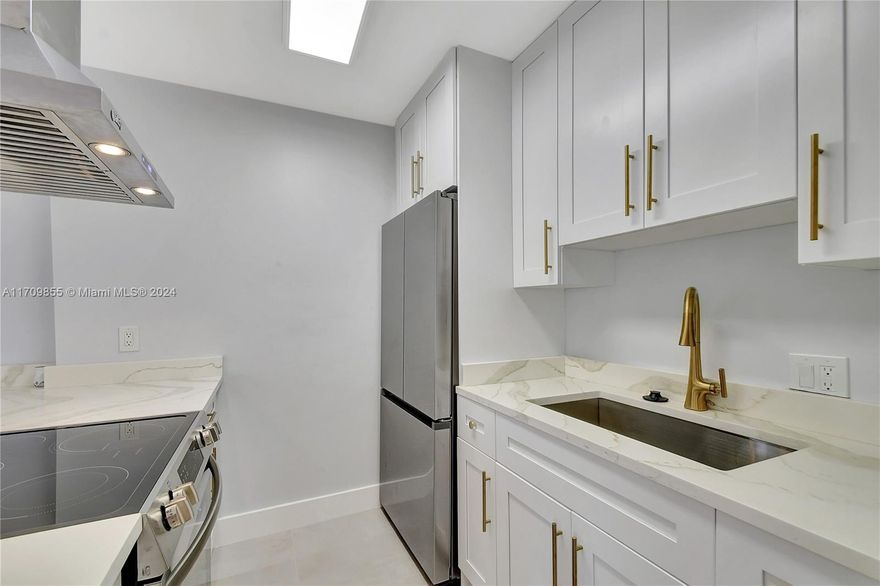 This beautifully remodeled 2-bed, 2-bath condo is ready for its new owner! Featuring an open floor plan and modern updates, it’s perfect for easy living. The kitchen boasts new appliances, quartz countertops, and fresh cabinets. New paint, ceramic tile floors, and updated baseboards flow throughout the unit.Both bathrooms have been fully renovated. Enjoy the convenience of a tankless water heater and full-size washer/dryer inside the unit. Step outside to a private fenced courtyard or relax on the upstairs balcony patio. Additional features include a new roof (2023) and fresh exterior paint.  The Crossings offers a pool, playground, tennis courts, and security patrol. Minutes from the beach, shopping, and dining—Move-in ready!