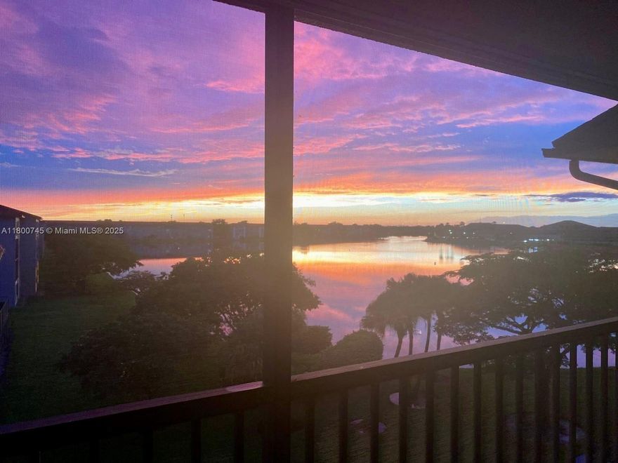 Enjoy stunning LAKE VIEWS from your 4TH FLOOR balcony! This LARGEST CORNER UNIT in Century Village boasts 1,533 sq.ft. of living space. Spacious 2 bedrooms and 2 bathrooms, with ample natural light throughout. Features include WASHER/DRYER, CENTRAL A/C (9 yrs old), water heater (2023), EAT-IN KITCHEN with STAINLESS STEEL appliances, WALK-IN CLOSETS, and ACCORDION SHUTTERS EVERYWHERE.Low Maintenance Fees: $789.74 (CVP: $283.24 + Landmark $506.50), including water, trash, sewer, basic cable, and internet.. Building amenities: resort-style clubhouse, gym, tennis courts, pools, and golf course. Parking space #45 and ample guest parking. Recently replaced roof (2018) and ELEVATOR IN BUILDING. Don't miss this incredible opportunity!!