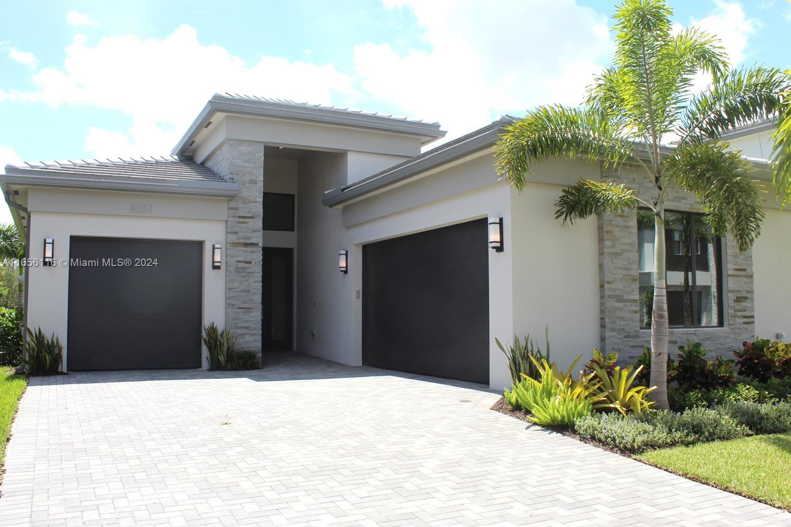 RARE OPPORTUNITY IN LOTUS PALM! Experience luxury at its finest with the newly built Premium Bermuda model, a waterfront masterpiece in Boca Raton's prestigious Lotus Palm community. This exquisite home offers unparalleled elegance and modern sophistication, featuring expansive living areas, a state-of-the-art gourmet kitchen, and high-end upgrades throughout, including premium finishes that elevate every space. The outdoor oasis invites relaxation with scenic water views, perfect for both entertaining and unwinding. Nestled in a gated community with resort-style amenities, this home epitomizes upscale living. A rare gem for the discerning buyer!