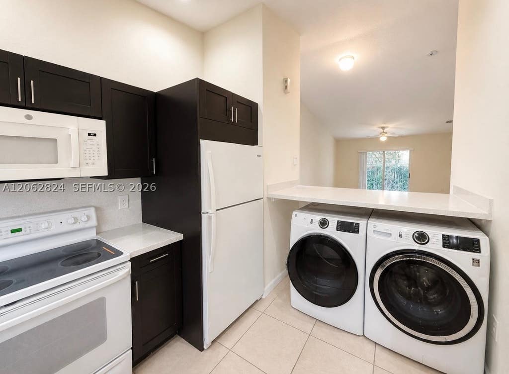 Photo of 3864 SW 48th Ave #3864, Hollywood, FL 33023 (MLS # A12062824)