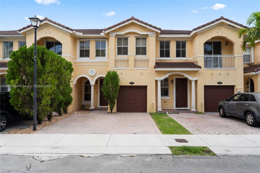 Welcome to your new townhome in the vibrant city of Miami! This stunning property boasts 3 bedrooms, 2.5 bathrooms, a spacious 1 car garage, and a community pool perfect for soaking up the Florida sun. The modern-kitchen features granite-counters- and-sleek black appliances, while-the-tile- flooring-adds a touch of elegance throughout the-home. The large master bedroom is a peaceful retreat after a long day, offering ample space- and-comfort. Located in the sought-after Grand Lakes area, this townhome is conveniently situated near major roads and a major shopping mall, making errands and entertainment a breeze. Don't miss out on this opportunity to make this beautiful townhome your new oasis in Miami!
