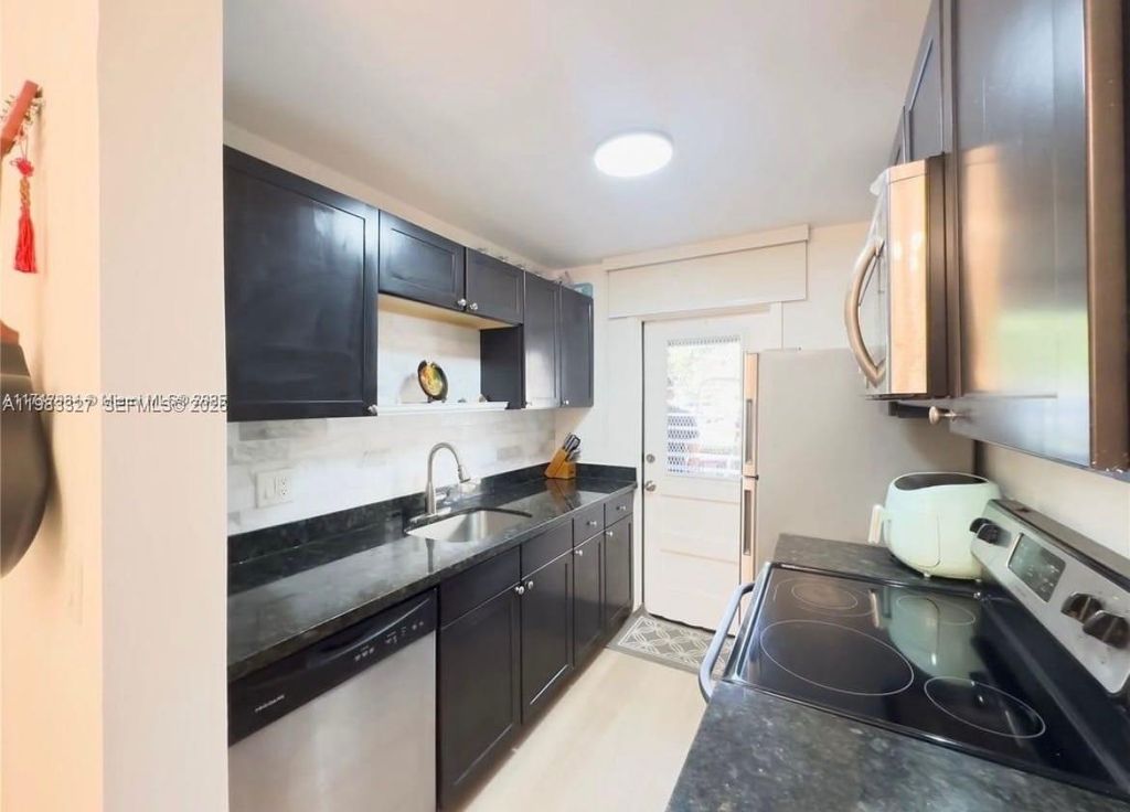 Photo of 1120 NE 10th St #2, Hallandale Beach, FL 33009 (MLS # A11983327)