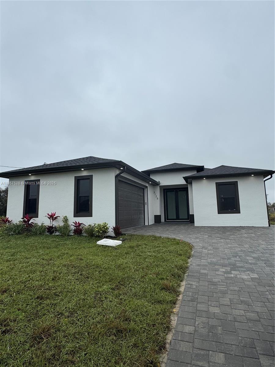 Motivated seller !! Discover modern living in this brand-new 3 bedroom, 2 bathroom home nestled in the vibrant community of Lehigh Acres. Enjoy the convenience of new appliances, energy-efficient windows, and a spacious layout perfect for families or those looking for a fresh start. Outside, the property provides ample space for outdoor activities or future expansions.