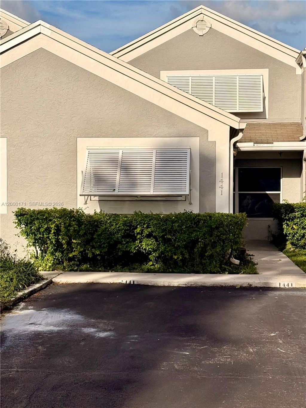 Photo of 1441 NW 122nd Ter, Pembroke Pines, FL 33026 (MLS # A12000171)