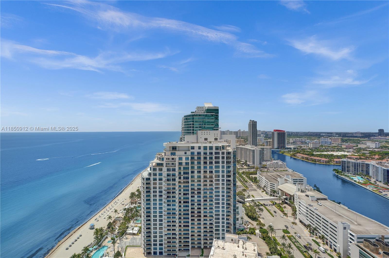 Welcome to 5-star living at Ocean Palms. Renovated 3 BD, 3.5 BA lower penthouse offers a private elevator entry into a grand double-door onyx foyer. Gorgeous panoramic ocean, Intracoastal & skyline, breathtaking views by day & beautifully lit at night from every room through floor-to-ceiling impact glass. Features:36x36 Spanish marble floors & baseboards, Venetian plaster walls, 2 terraces accessible from every rm., upgraded Italkraft kitchen w/Thermador oven & microwave, black granite countertops, Jerusalem marble backsplash, Miele & Sub-Zero appl., guest bath w/ travertine marble. Lutron smart system for lights, blinds & A/C, & high-speed wiring. Storage. Oceanfront luxury w/ valet, concierge, beach & pool svc, tennis, spa, 240 feet of pristine beachfront, 2-story gym & more. A must-see!