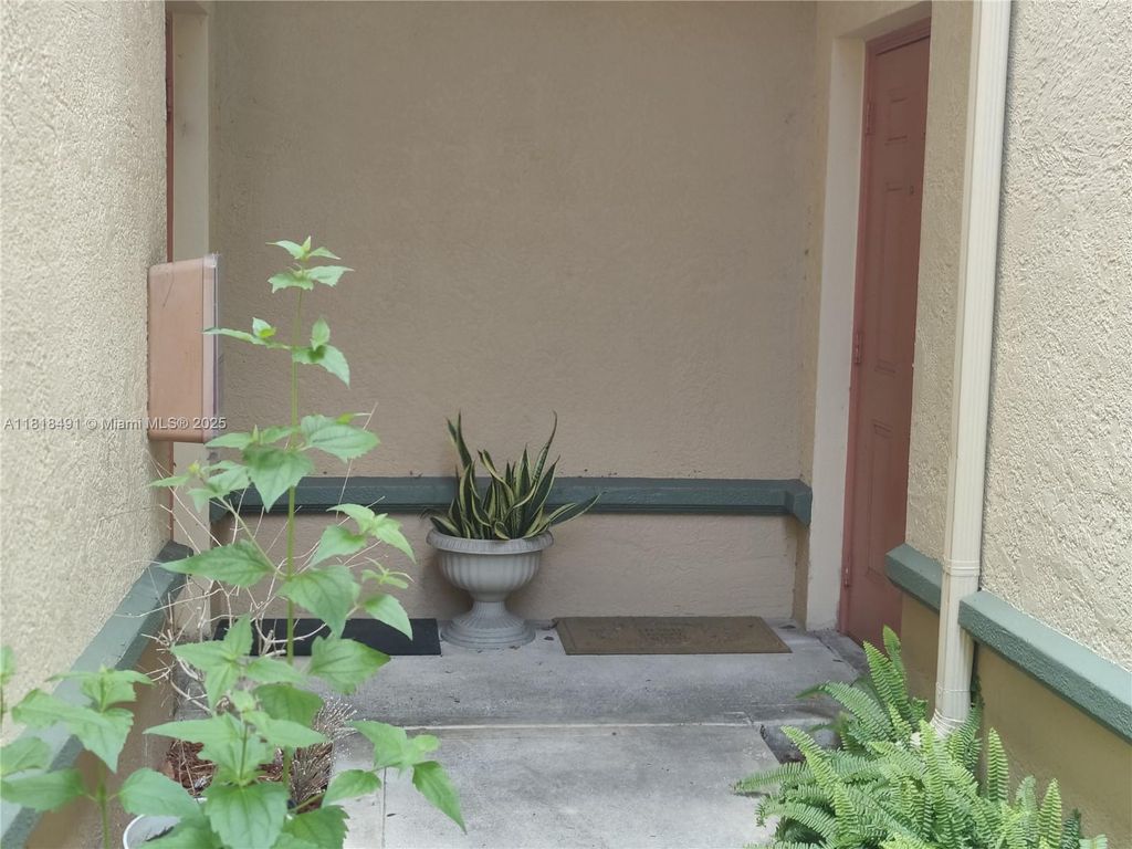 Photo of 2474 Centergate Dr #204, Miramar, FL 33025 (MLS # A11818491)