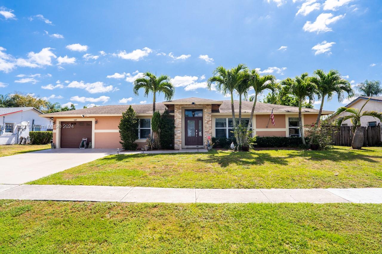 Property for Sale at 147 Dove Cir Cir, Royal Palm Beach, Palm Beach County, Florida - Bedrooms: 5 
Bathrooms: 3  - $799,999