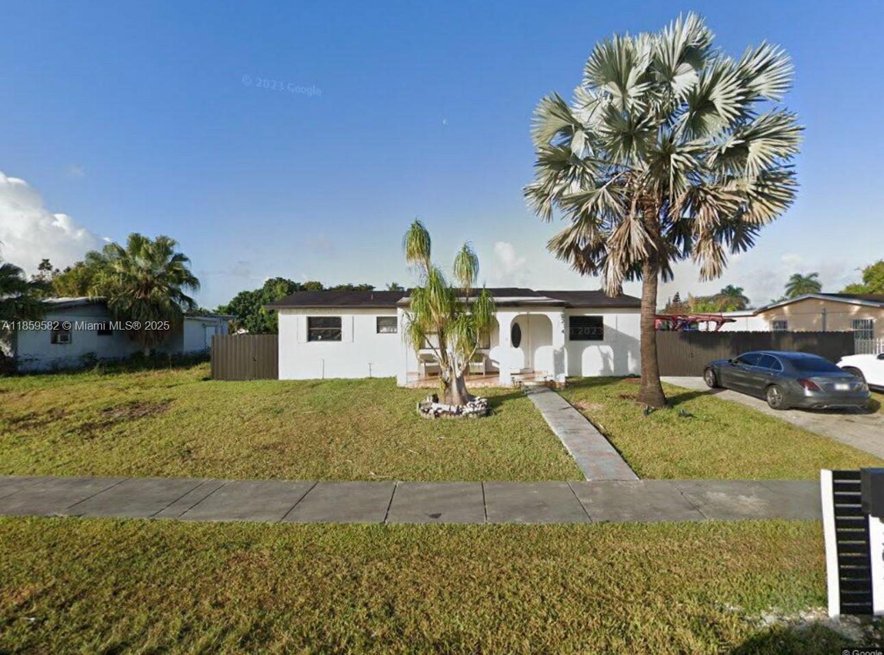 Step into this stunning 4-bedroom, 2-bath residence, recently renovated from top to bottom! Featuring a modern kitchen with quartz counters, stylishly updated bathrooms, new flooring throughout, and fresh interior paint. The roof was replaced in 2019 for added value. Relax in your private backyard adorned with longan and avocado trees, and enjoy peaceful canal views. Ideally situated close to schools and the Homestead Pavilion Shopping Center. A perfect blend of comfort, style, and location—schedule your showing today!