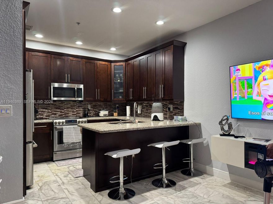 Luxurious townhouse completely remodeled with excellent conditions. Spacious two bedrooms. Beautiful and comfortable home. Modern kitchen with stainless steel appliances, granite countertops, and spacious living and dining areas. Community amenities include a swimming pool, gym, clubhouse, etc. Convenient area with 24-hour security service and close to malls. Tenant ocupied unitl August 14, 2026. Washer and dryer in the unit and private parking.