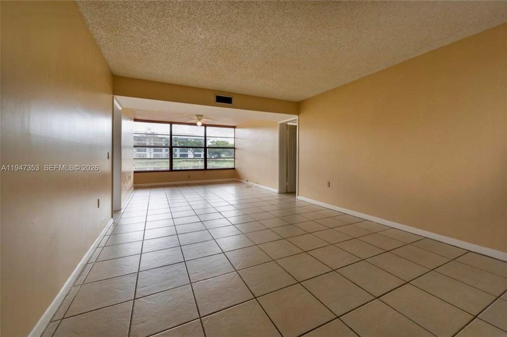 Photo of 1520 Whitehall Dr #101, Davie, FL 33324 (MLS # A11947353)