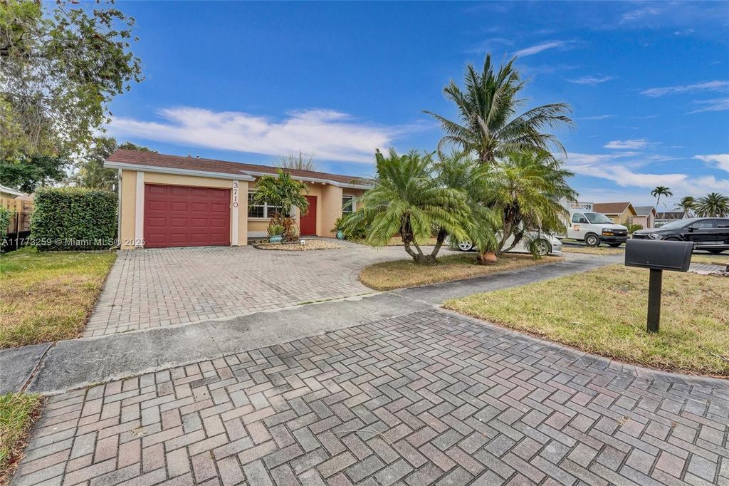 Photo of 3710 NW 119th Ave, Sunrise, FL 33323 (MLS # A11773259)