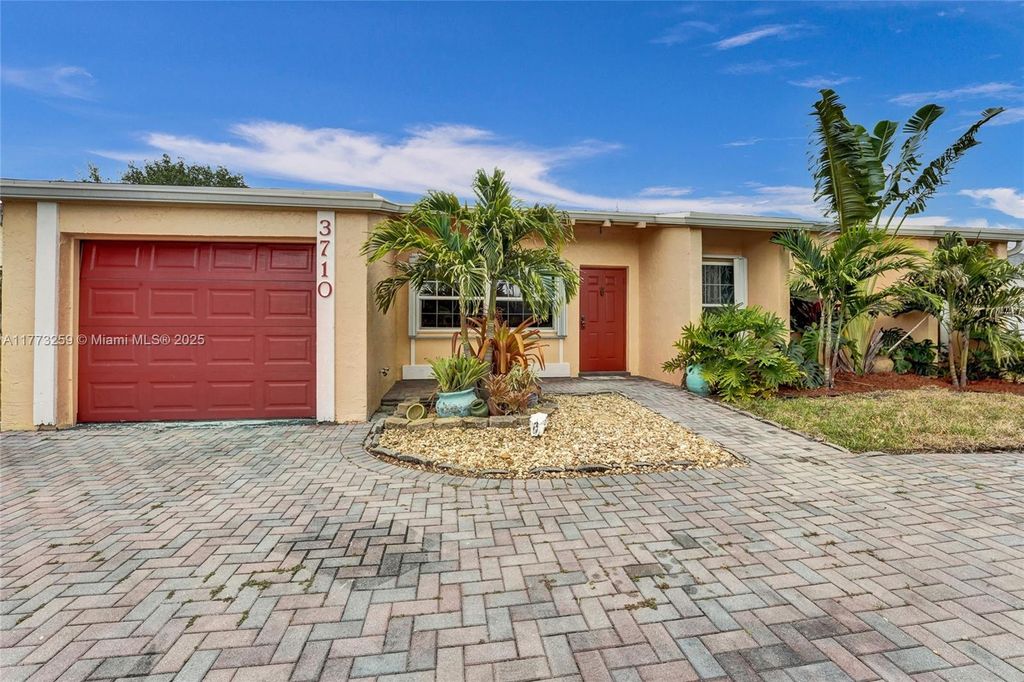 Photo of 3710 NW 119th Ave, Sunrise, FL 33323 (MLS # A11773259)