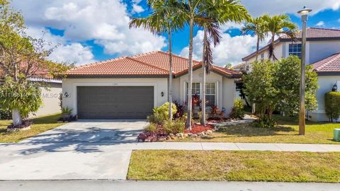 Photo of 1391 SW 181st Ave, Pembroke Pines, FL 33029 (MLS # A11968346)