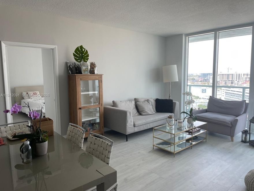 Spacious 2-bedroom, 2.5-bath residence offering open views of Biscayne Bay and the Wynwood area. The unit features a functional floor plan with laminate wood flooring throughout and a private balcony with access from both bedrooms and the living area. Open living and dining spaces provide comfortable everyday living, while both bedrooms include en-suite bathrooms. A guest half bath adds convenience.

Quantum on the Bay offers a full-service lifestyle with amenities that include a fitness center, library, resident lounge, reading and social areas, and 24-hour security. The building provides direct access to Margaret Pace Park, featuring waterfront walking paths, recreational courts, and green space.

Centrally located in Edgewater with easy access to Downtown Miami, Wynwood, Brickell, Miami Beach, dining, shopping, and major roadways.