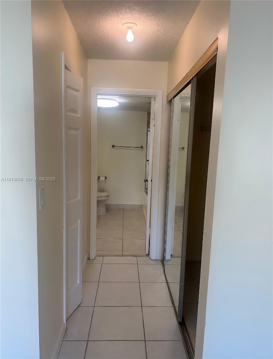 BUILDING FIVE OF RACQUET - Residential Lease