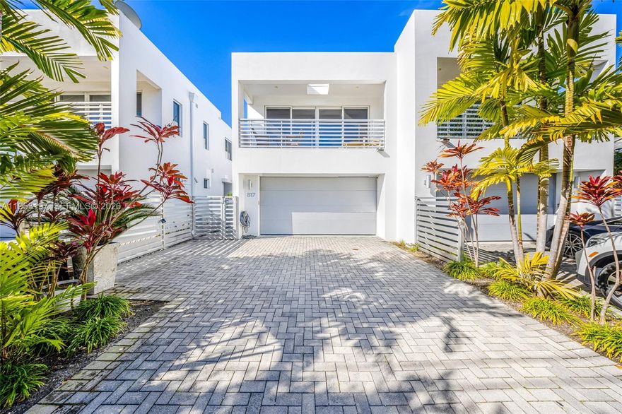 Modern, immaculate 3 Bed, 3.5 bath plus den townhome located in the heart of highly sought-after Victoria Park. This designer-finished residence offers a private entrance, 2-car garage, and open-concept living ideal for both everyday living and entertaining. Interior features include 10' ceilings, large-format tile throughout, floating staircase, quartz countertops, Bosch appliances, gas stove and water heater, walk-in closets with custom built-ins, designer lighting, impact windows, and custom electric blinds. The second level features two spacious primary suites, a third bedroom, a loft/den area, private terrace, and a full laundry room with additional storage. Enjoy rare outdoor living with a private fenced yard and newly added modern private plunge pool perfect for South Florida living. Prime location within walking distance to dining, shopping, and nightlife. ADT security cameras and alarm system, No HOA, no rental restrictions, no flood zone! Has everything you could want. Just minutes to Las Olas Boulevard, Galleria Mall, Fort Lauderdale Beach, and FLL Airport. Golf cart available!